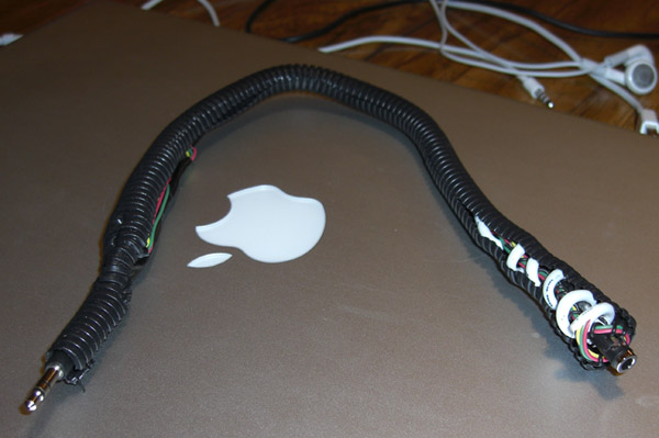 Wrapping iphone adapter with wire loom.