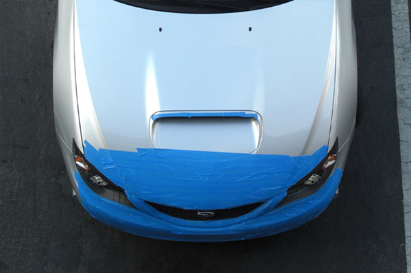 Front end wrapped up with 3M masking tape, cross country mode.
