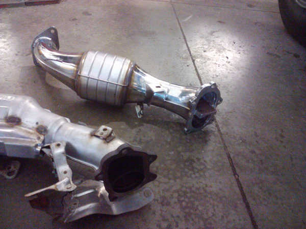 OEM and Prodrive downpipes.